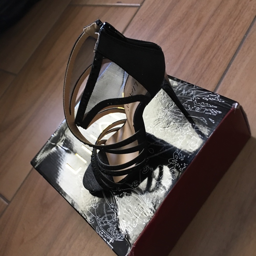 Black strapped heels